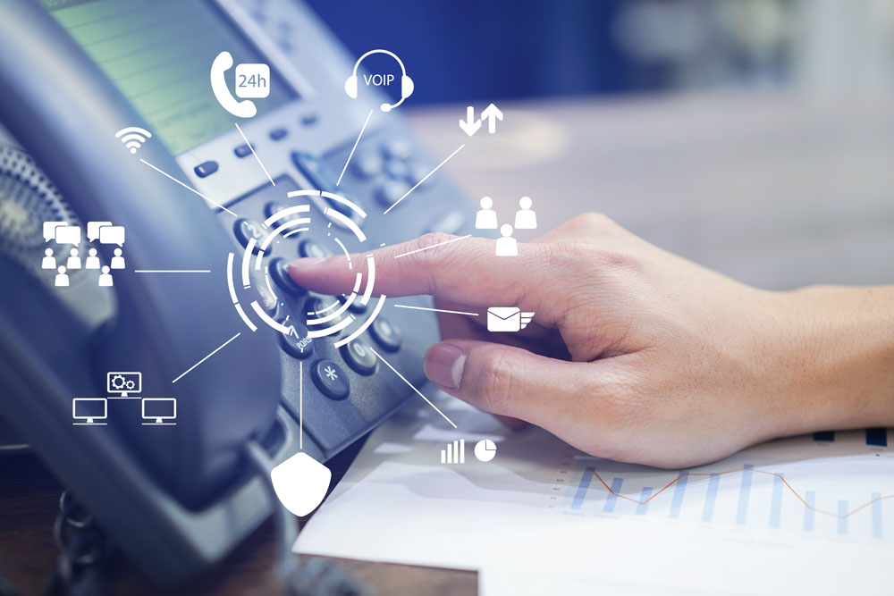 Person making a call on a business phone landline.